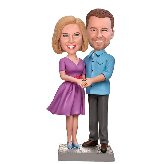 A Couple Holding Hands Custom Bobbleheads With Engraved Text
